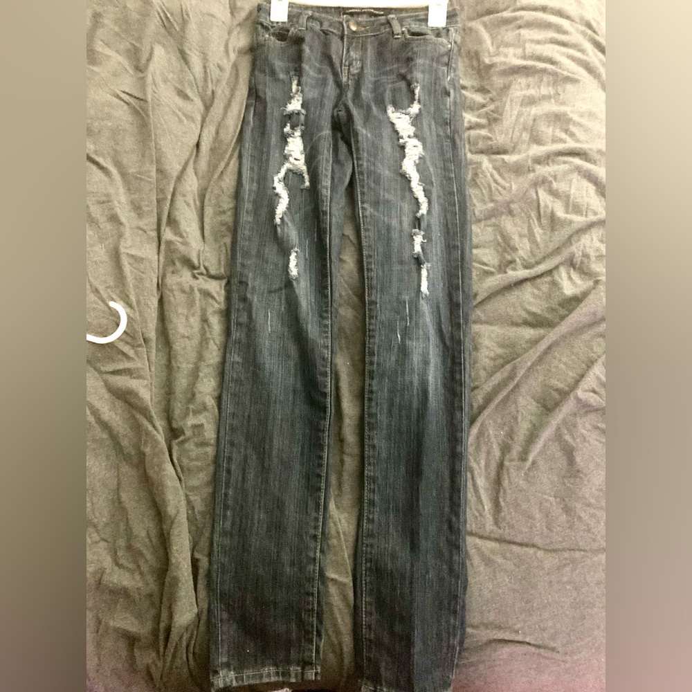 Light washed ripped jeans,size 0